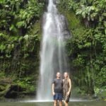 Guests take photo at Benang Stokel Waterfall in Aik Berik, Lombok