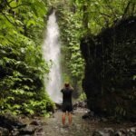 Keliwun Waterfall surrounded by forest in Aik Berik village