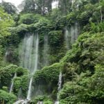 Tourists swimming at Benang Kelambu natural spring.