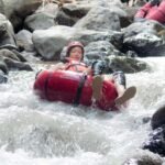Mid-route river tubing section with mixed currents in Babak River